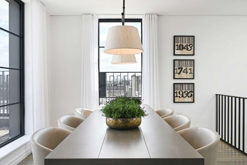 Dining area with a view through the steel-framed window